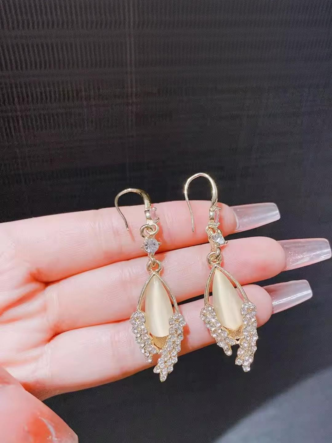 Nitant Leaf Shaped Long Drop Stones Studded Earrings
