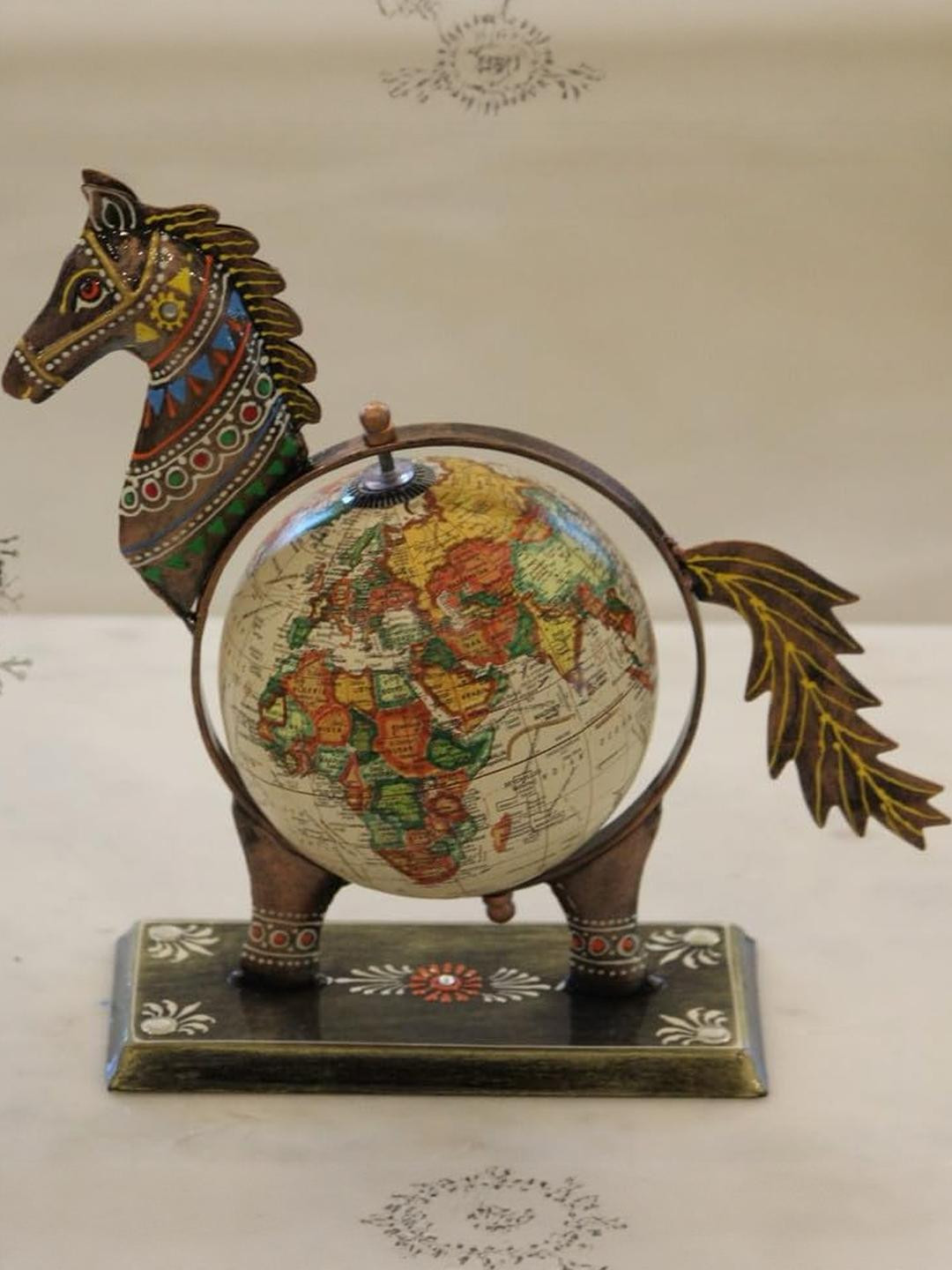 The SK Creative Arts Decorative Globe Metal Horse Table Top Showpiece