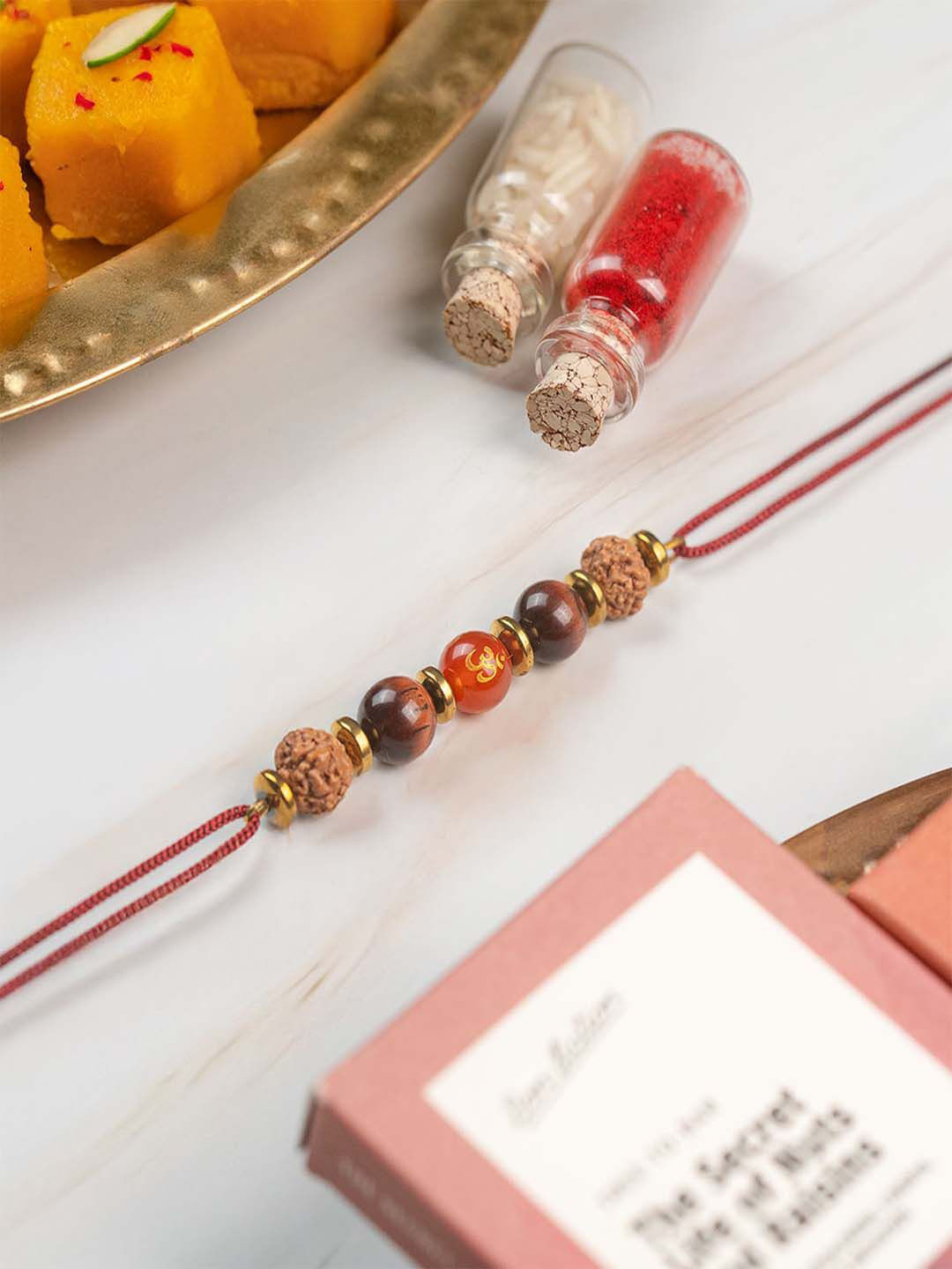 Mesmerize Spiritual Om Rudraksh Stone Rakhi