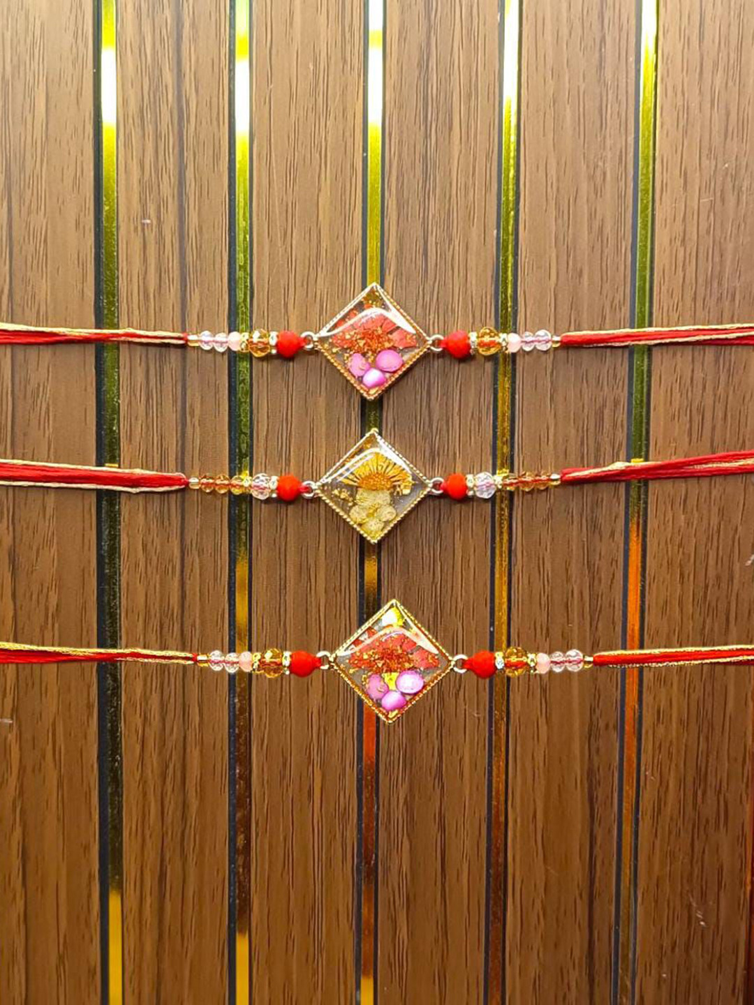 PUFFSMART Resin Artificial Beaded Bhaiya Bhabhi Rakhi With Roli Chawal