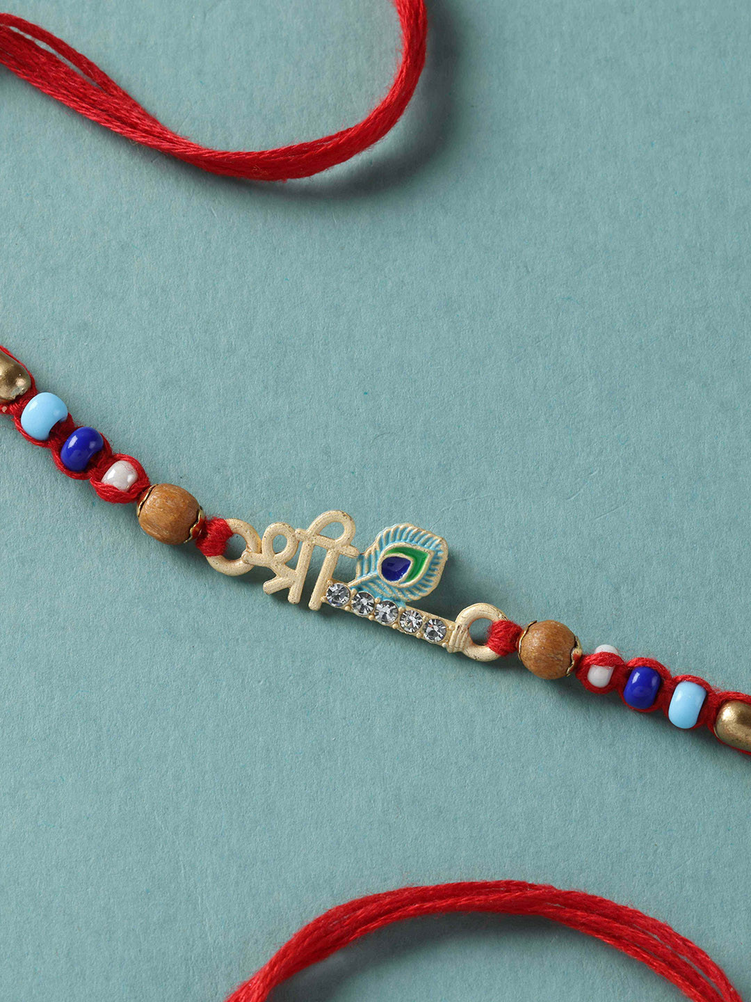 fnp Artificial Stones Studded & Beaded Divine Krishna Thread Rakhi