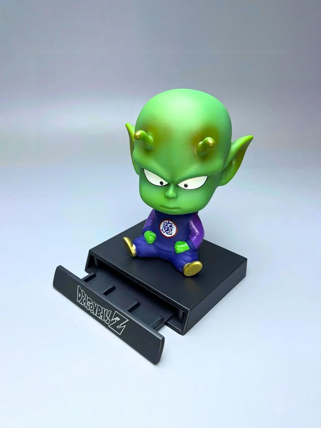 AUGEN Green & Blue Piccolo Figure Bobblehead Showpieces