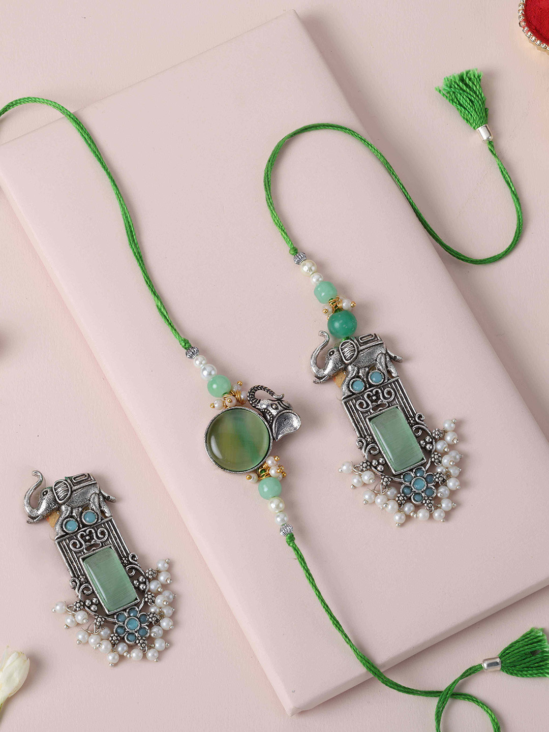 fnp Artificial Stones Studded And Beaded Charming Pair Bhaiya-Bhabhi Rakhi