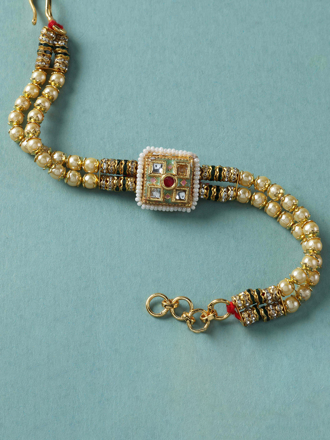 fnp Artificial Stones Studded & Beaded Precious Bond Wraparound Rakhi