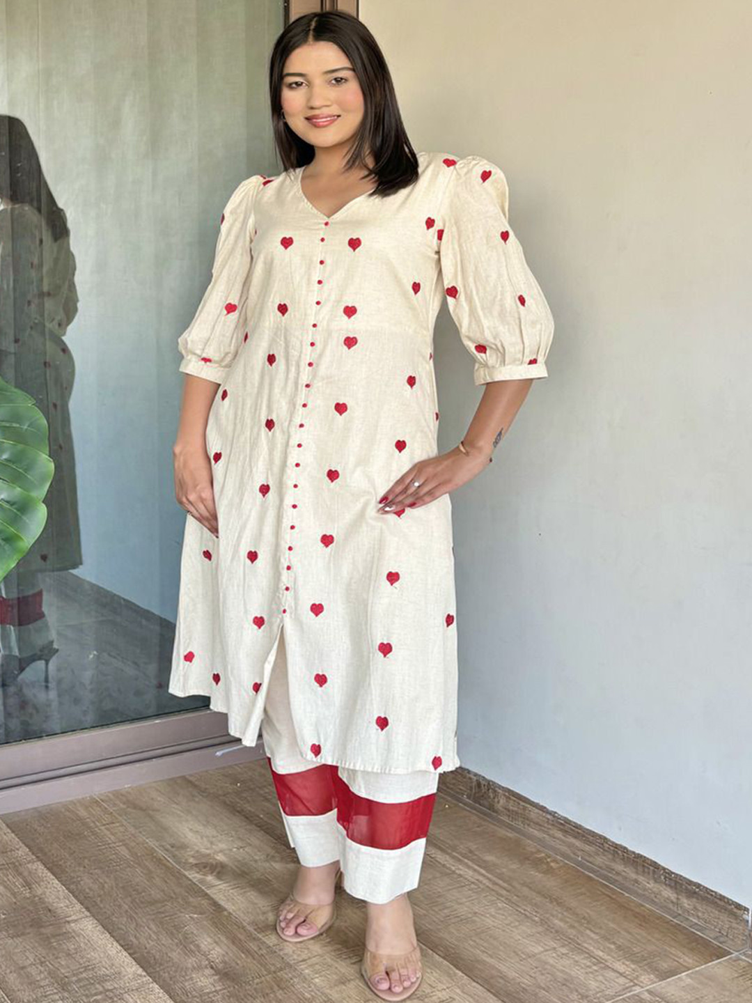 FFI Women Elegant Beige & Red Heart Motif Kurta Set with Panel Trousers