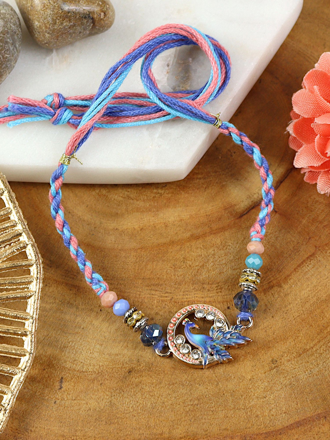 Asthetika Americon Diamond Studded And Beaded Peacock Shaped Thread Rakhi