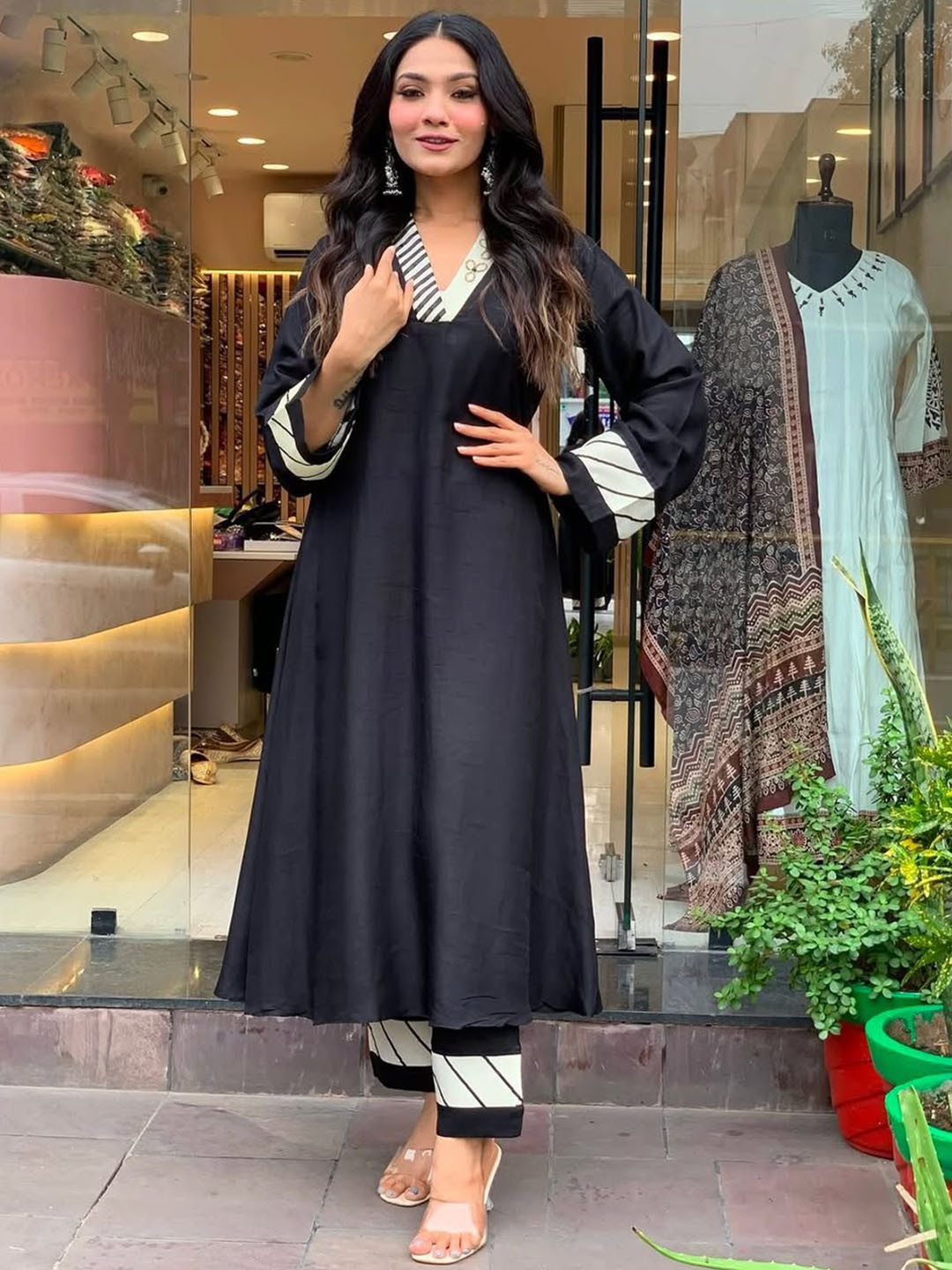 S.K.C Women Solid Kurta with Trousers