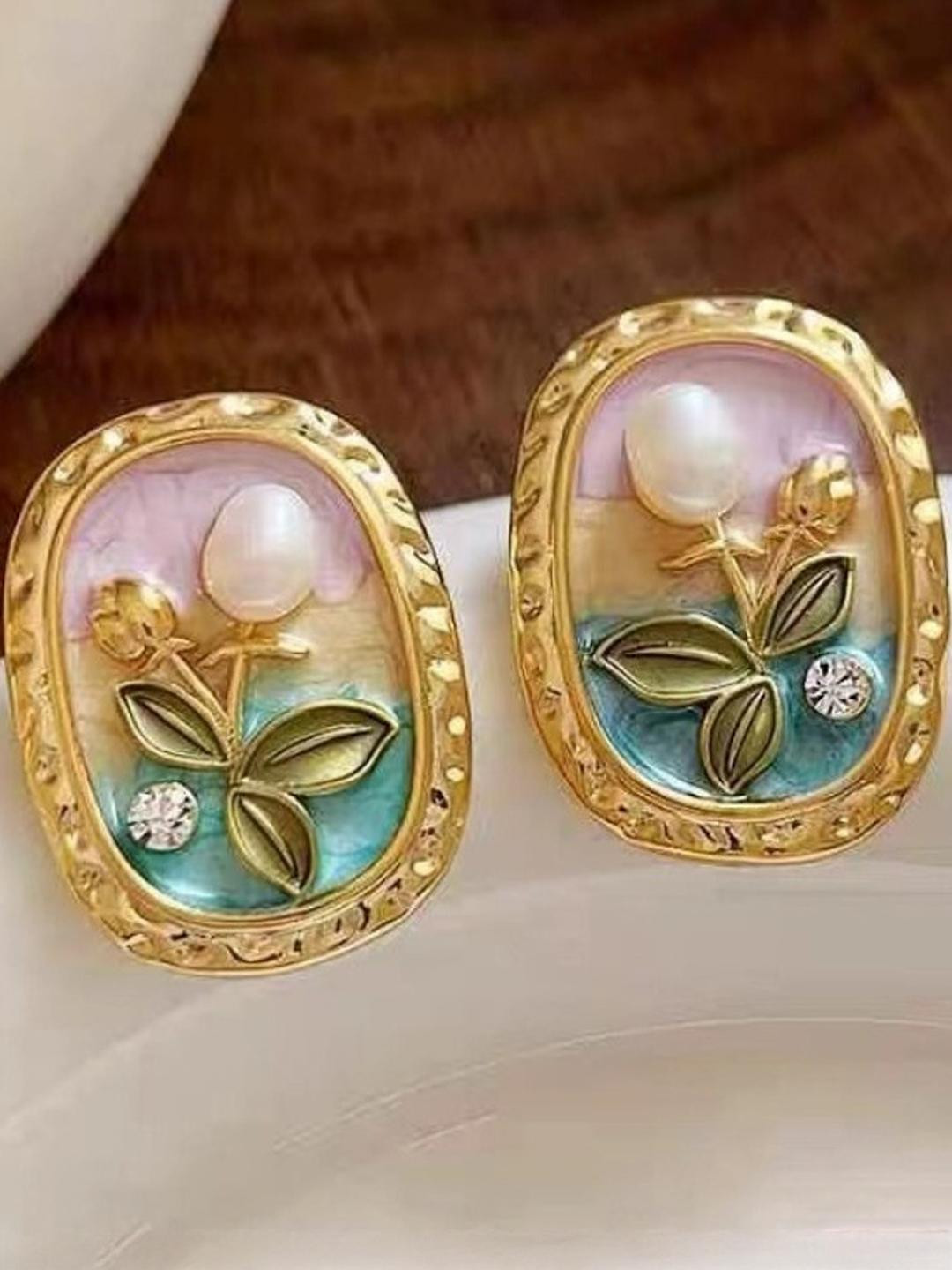 AKISON JEWELS Crystals Earrings Ornate Floral design and oval shape