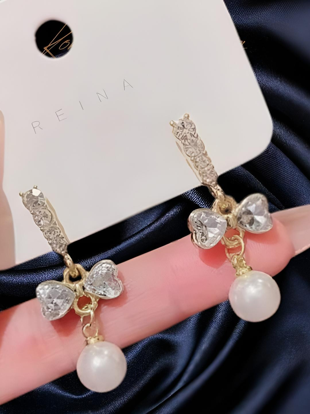 AKISON JEWELS Stone Studded Bow Earrings