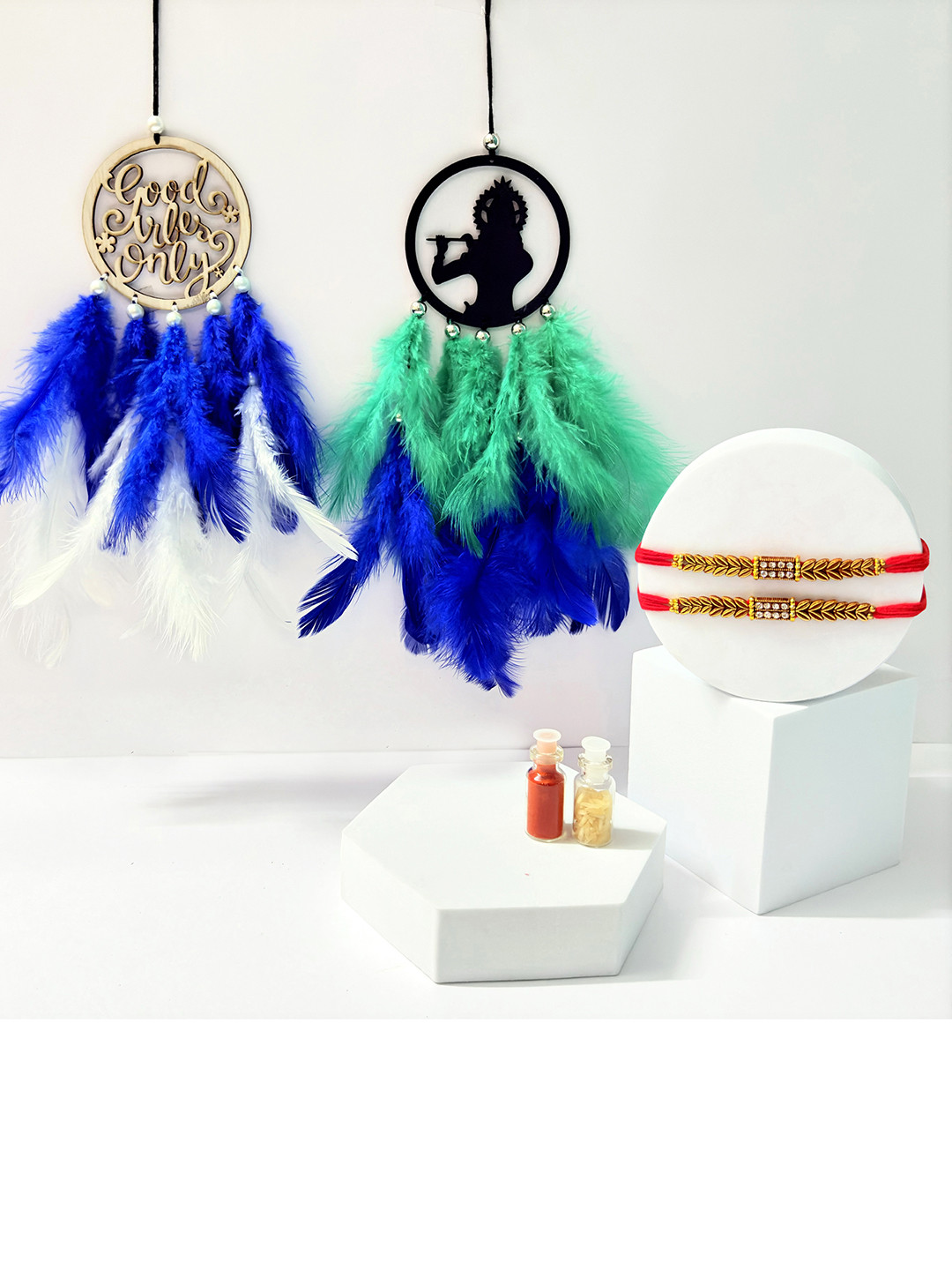 COLOR SPLASH Set Of 2 Thread Rakhis With Good Vibes & Krishna Dream Catcher & Roli