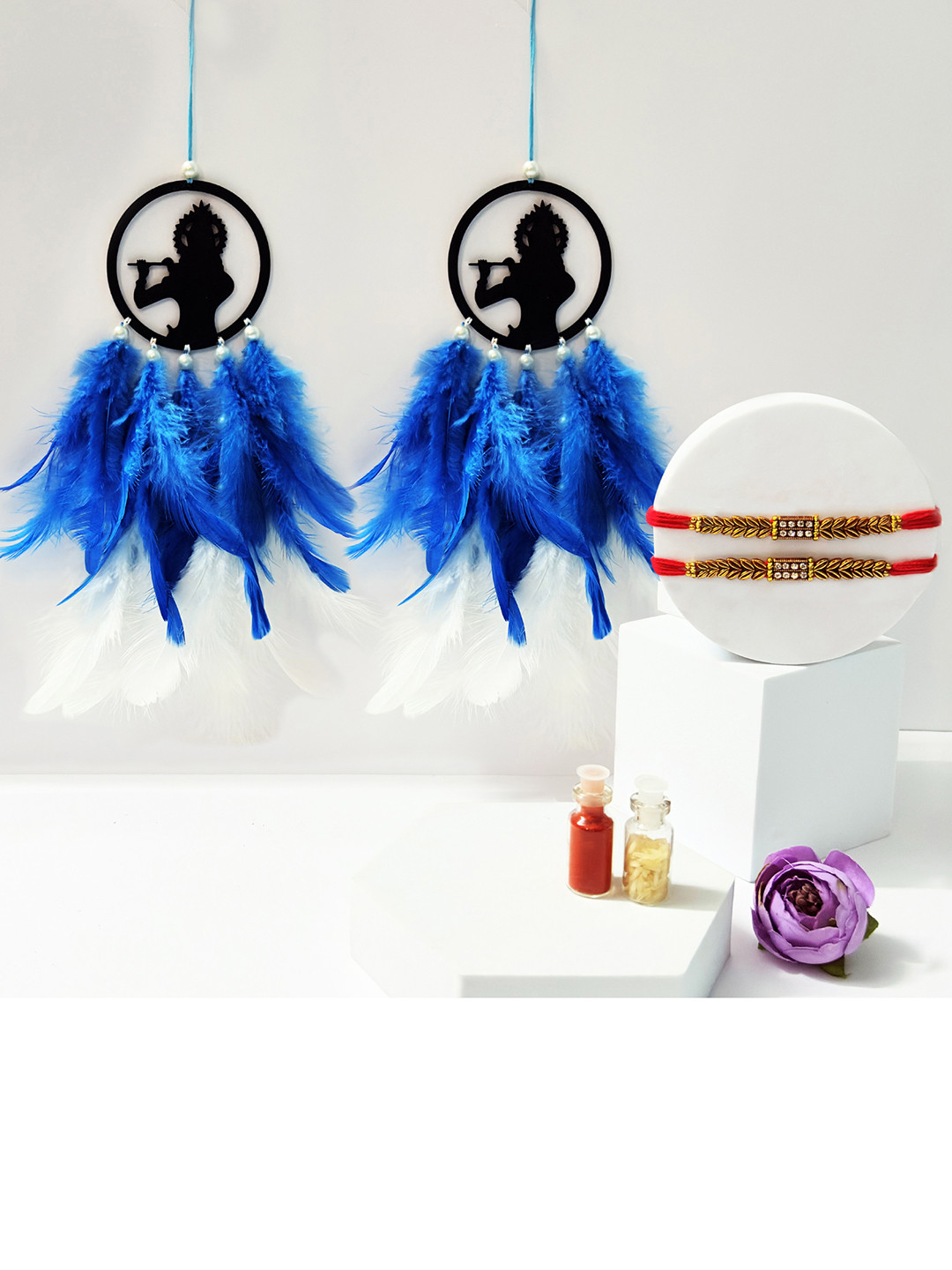 COLOR SPLASH Set Of 2 Thread Rakhis With Krishna Dream Catcher & Roli Chawal