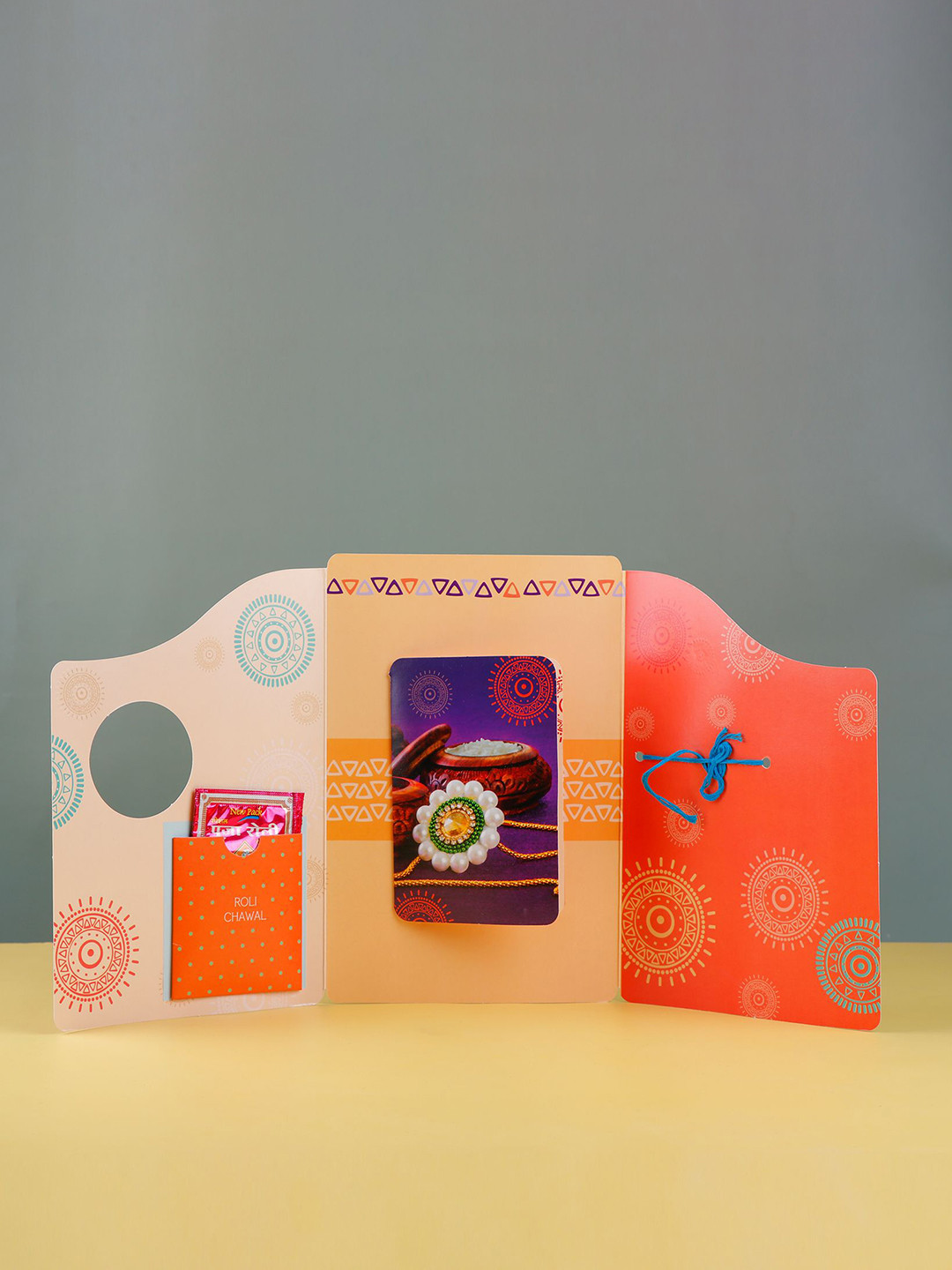 Archies Set Of 2 Sacred Rakhi & Heartwarming Greeting Card With Roli Chawal