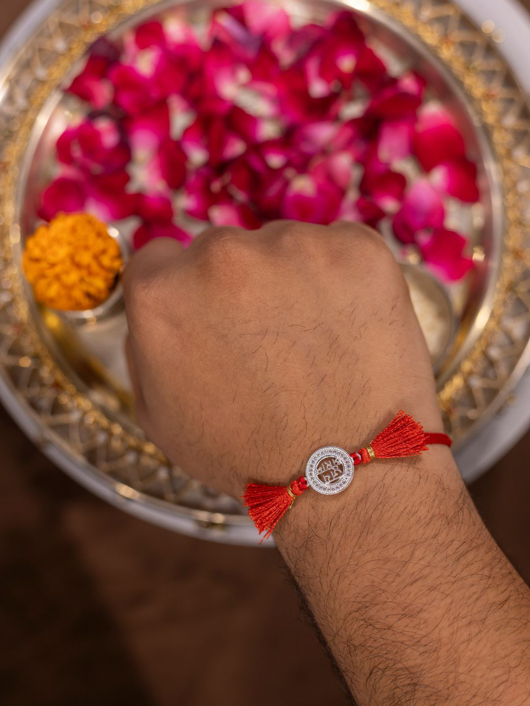 Anouk 4-Pcs Rakhi With Complimentary Roli Chawal Plate & Potli
