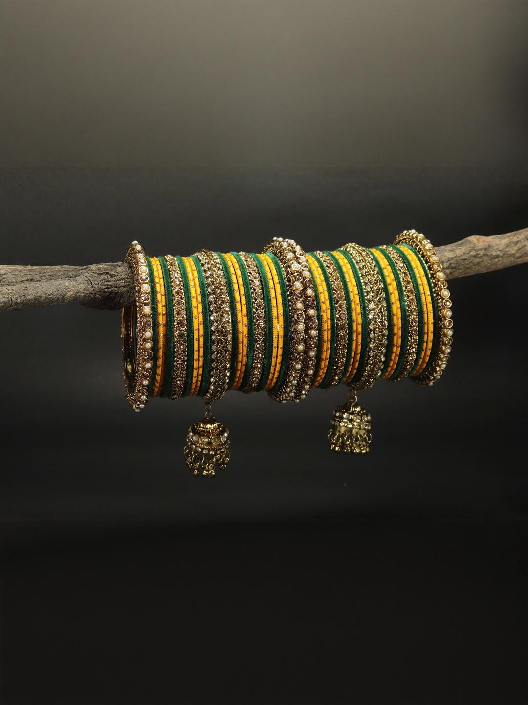 Amika Women Yellow & Green Zircon Gemstone Jhumka Latkan 42 Pieces Bangles