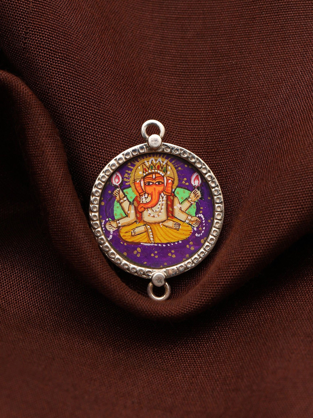 Exotic India Sterling Silver Four-Armed Lord Ganesha Circular Pendants