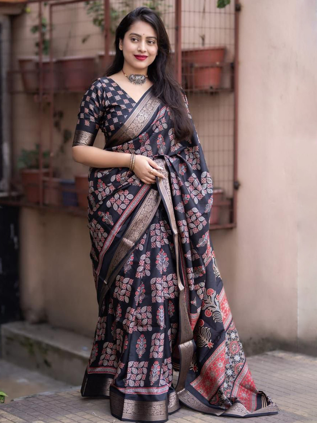 Swaraas Ajrak Print Zari Ikat Saree