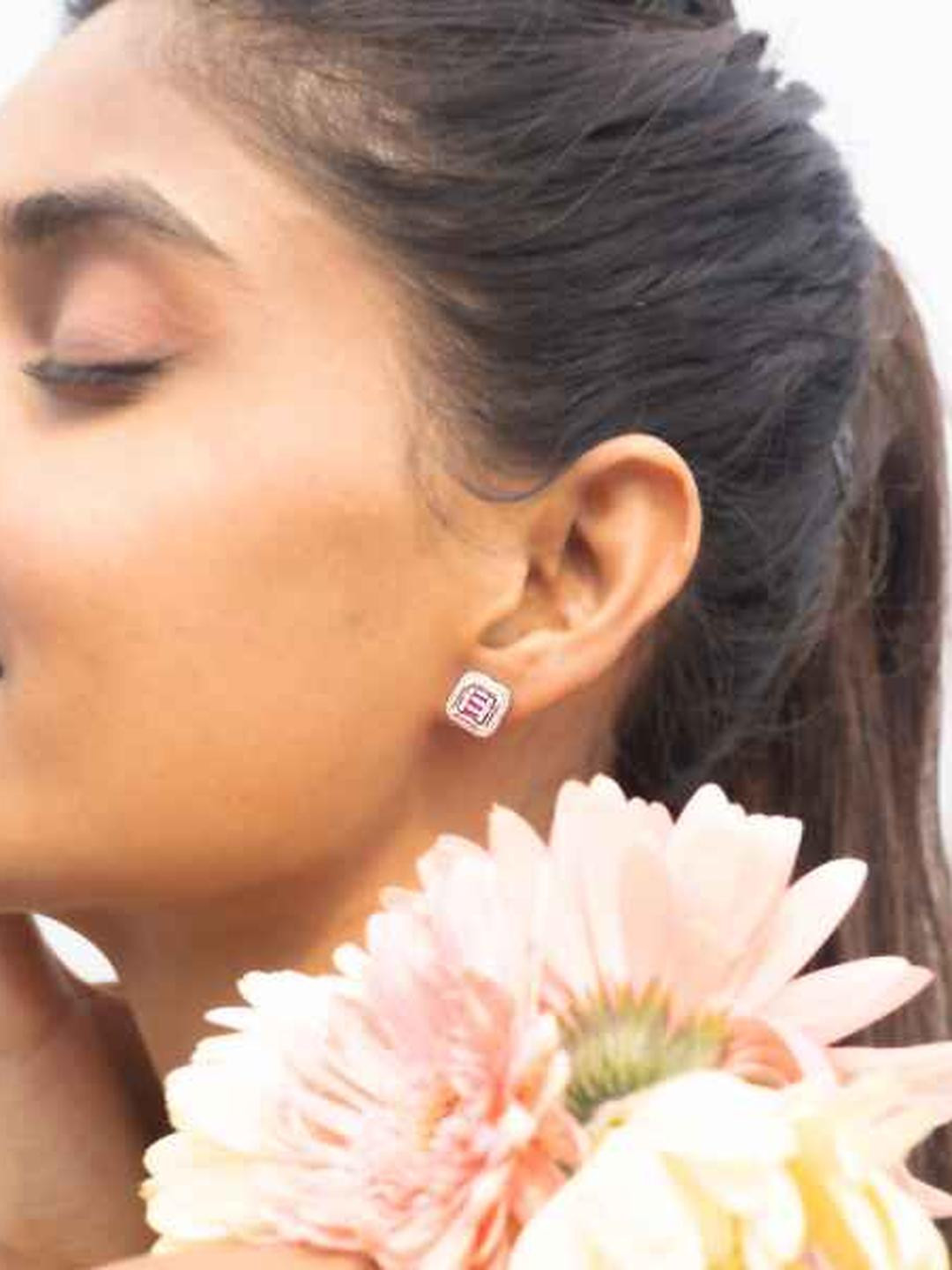 Ruby Baguette and Diamond Studded Rosetta Studs on 925 Silver.