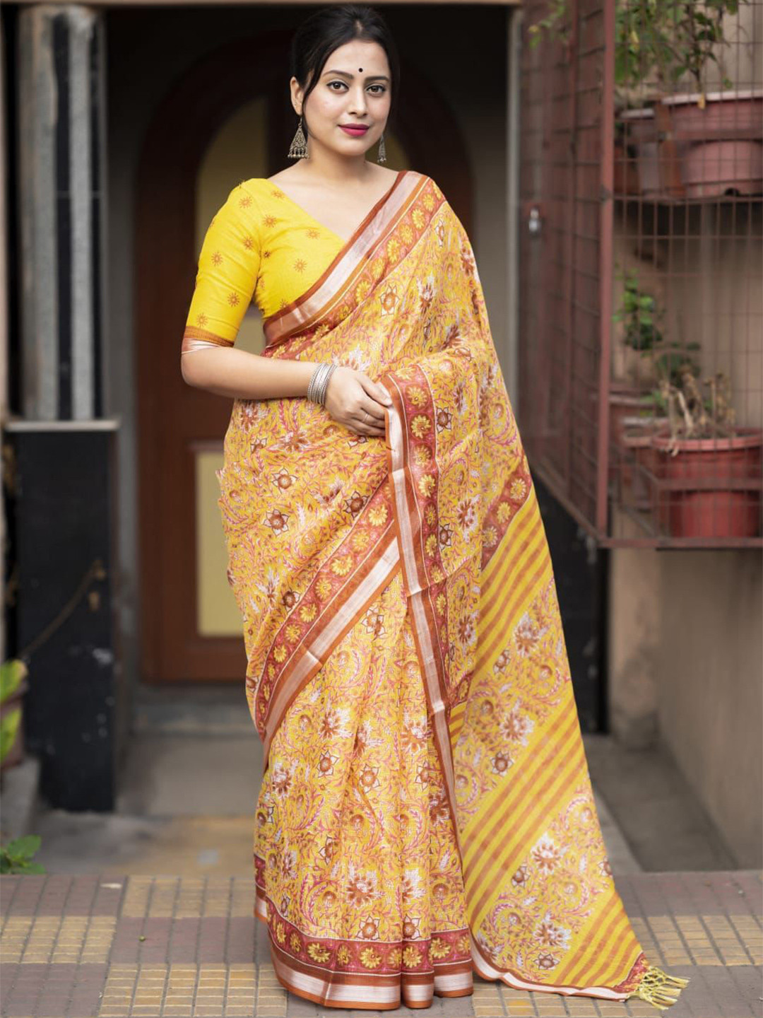 Swaraas Ajrak Printed Ikat Saree