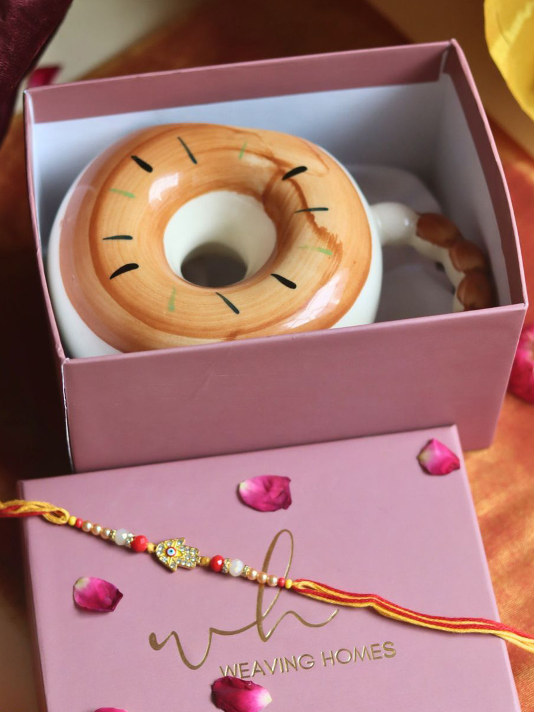 WEAVING HOMES Brown & White Donut Printed Ceramic Mug 250ml With Rakhi