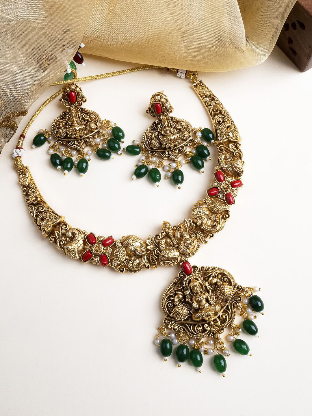 StileAdda Women Antique Finish Laxmi Necklace Set With Green Droplet Earrings
