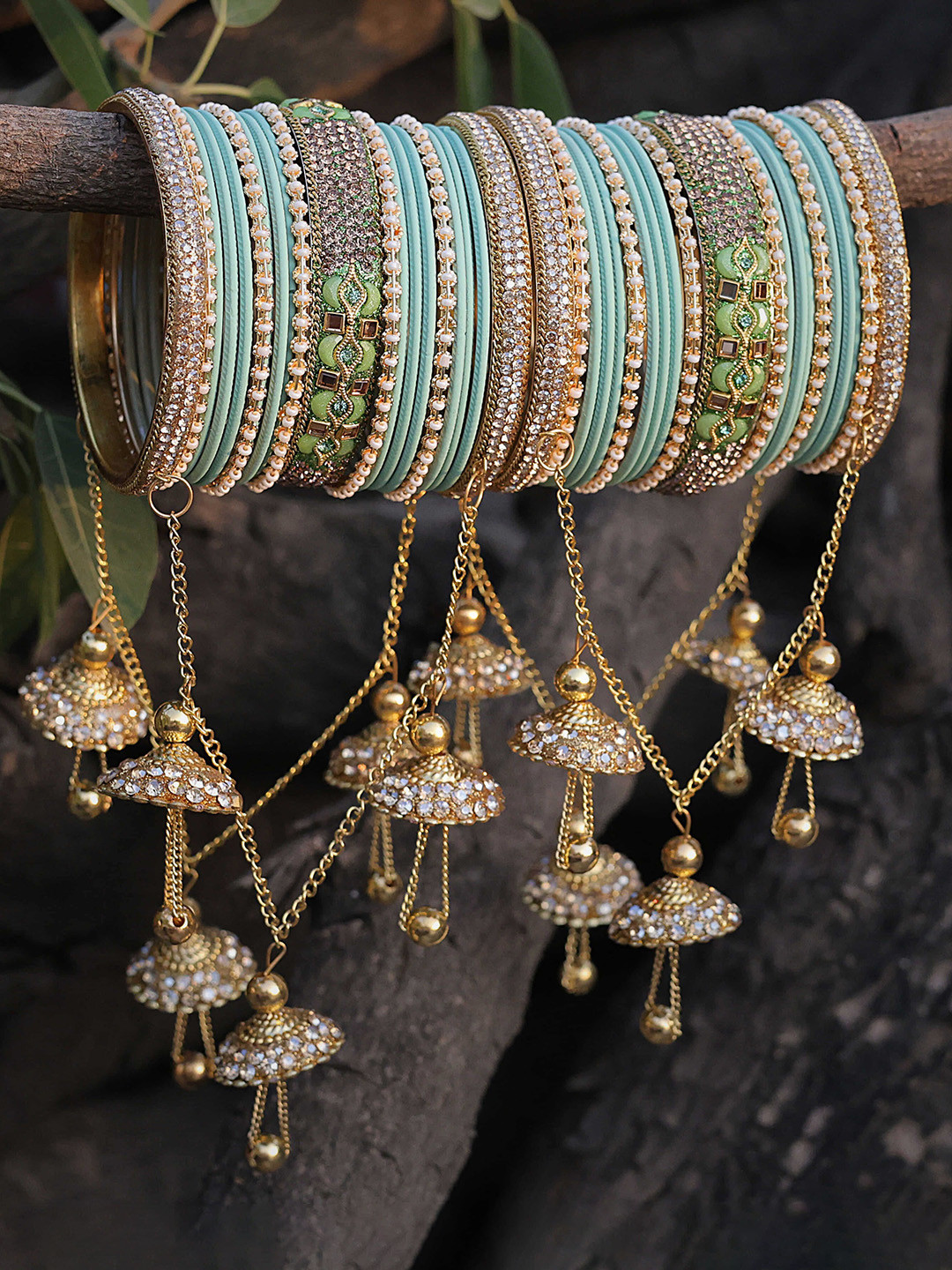 Amika Set Of 42 Gold-Plated Velvet Bridal Stylish Glossy Finish Latkan Bangles