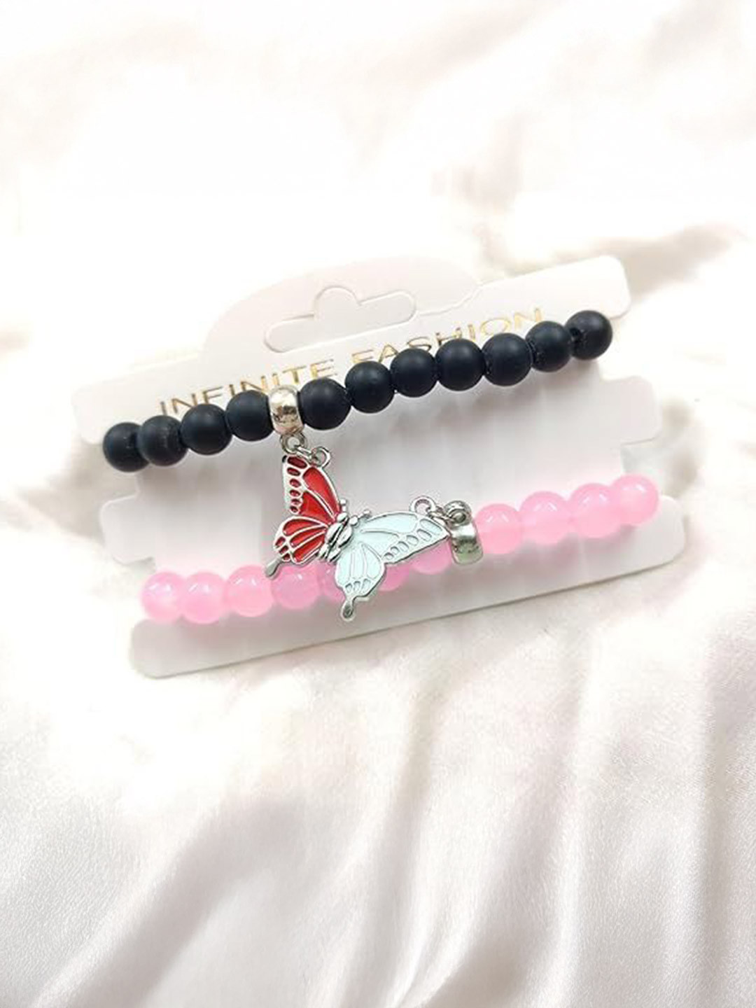 Lovemi Movements Girls Set Of 2 Artificial Beaded Butterfly Charm Elasticated Bracelets