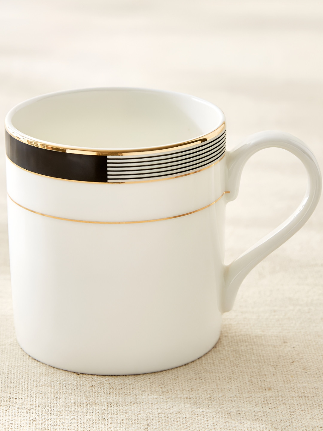 Home Centre Andrey Ralph White & Black Porcelain Matte Cup & Saucer