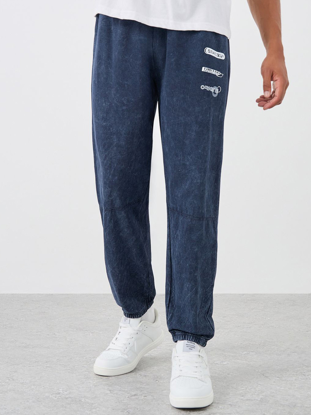 Styli Men Graphic Print Relaxed Fit Wide Leg Joggers