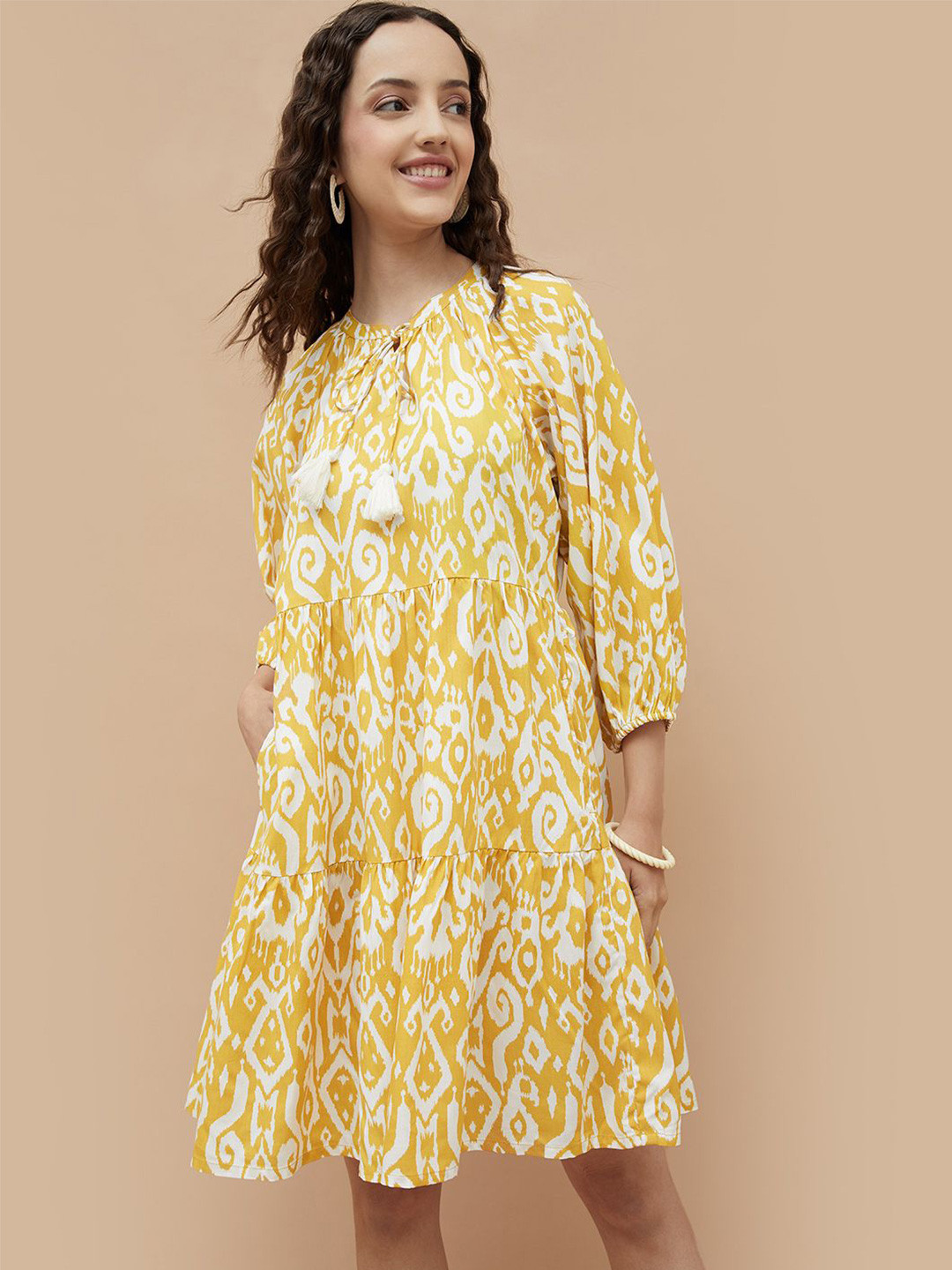 Colour Me by Melange Women Ikat Printed Tie-Up Neck Puff Sleeve Tiered A-Line Dress