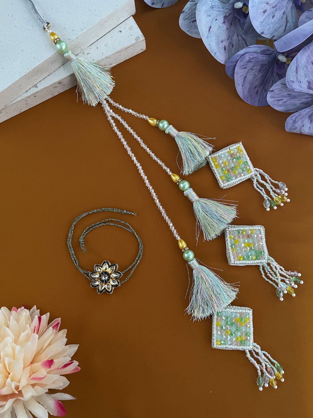 Digital Dress Room Set Of 2 Flower Kundan And Tasselled Bhaiya Bhabhi Lumba Rakhi
