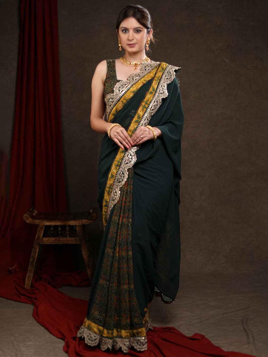 SUJATRA Women Ajrak Emroidered Poly Georgette Saree