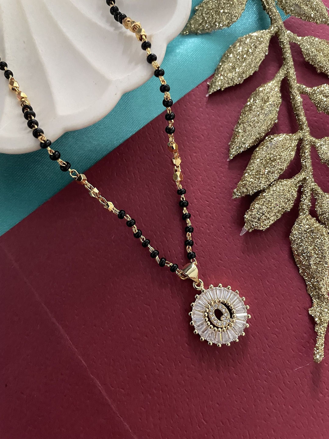 Digital Dress Room Gold-Plated Artificial Stones Studded And Beaded Q Letter Mangalsutra