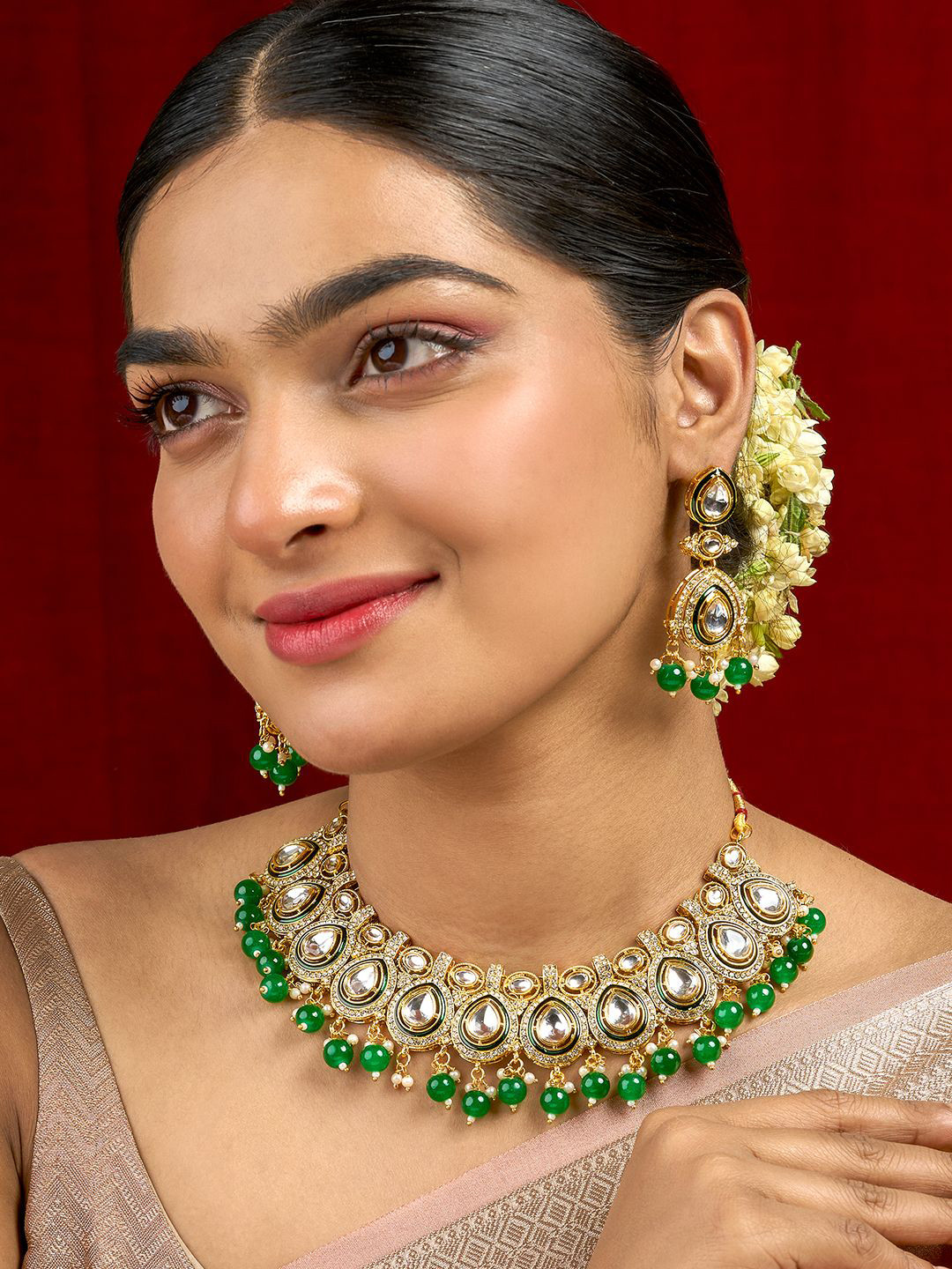 TEEJH Gold-Plated Vismaya Green Stone-Studded & Beaded Jewellery Set