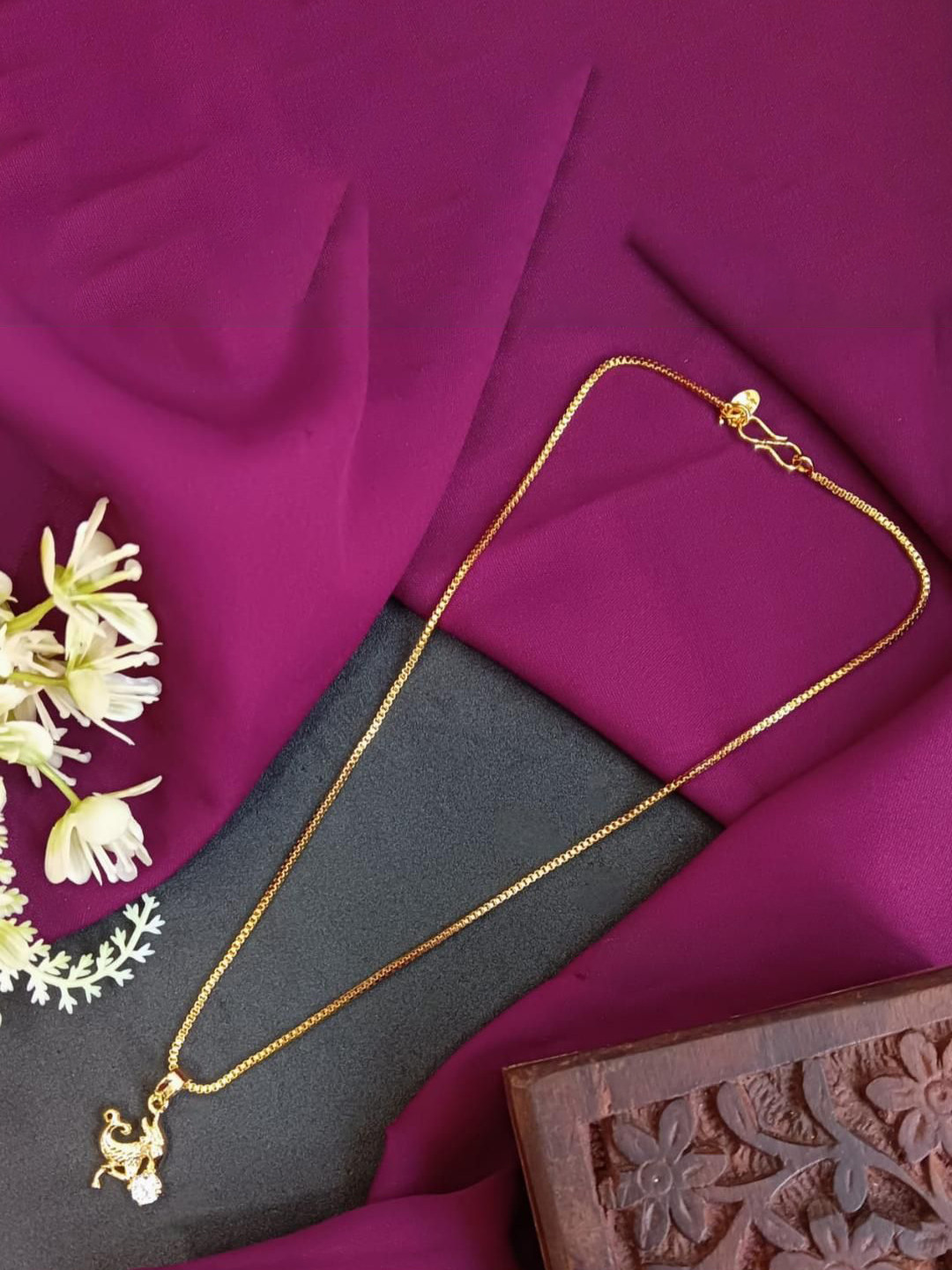 Efulgenz Gold-Plated Cubic Zirconia Studded Zodiac Aries Sign Pendant With Chain