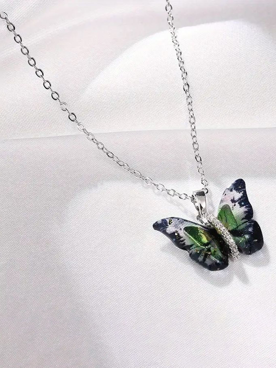 Utkarsh Unisex Stainless Steel Artificial Stones Studded Butterfly Shaped Pendant & Chain