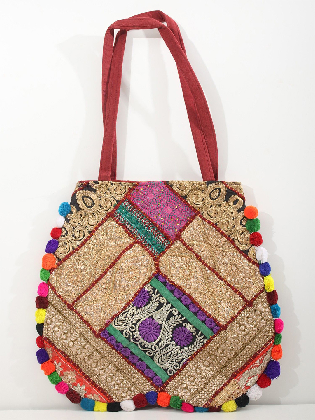 Exotic India Patchwork Zari Embroidered Cotton Shoulder Bag with Pom Poms
