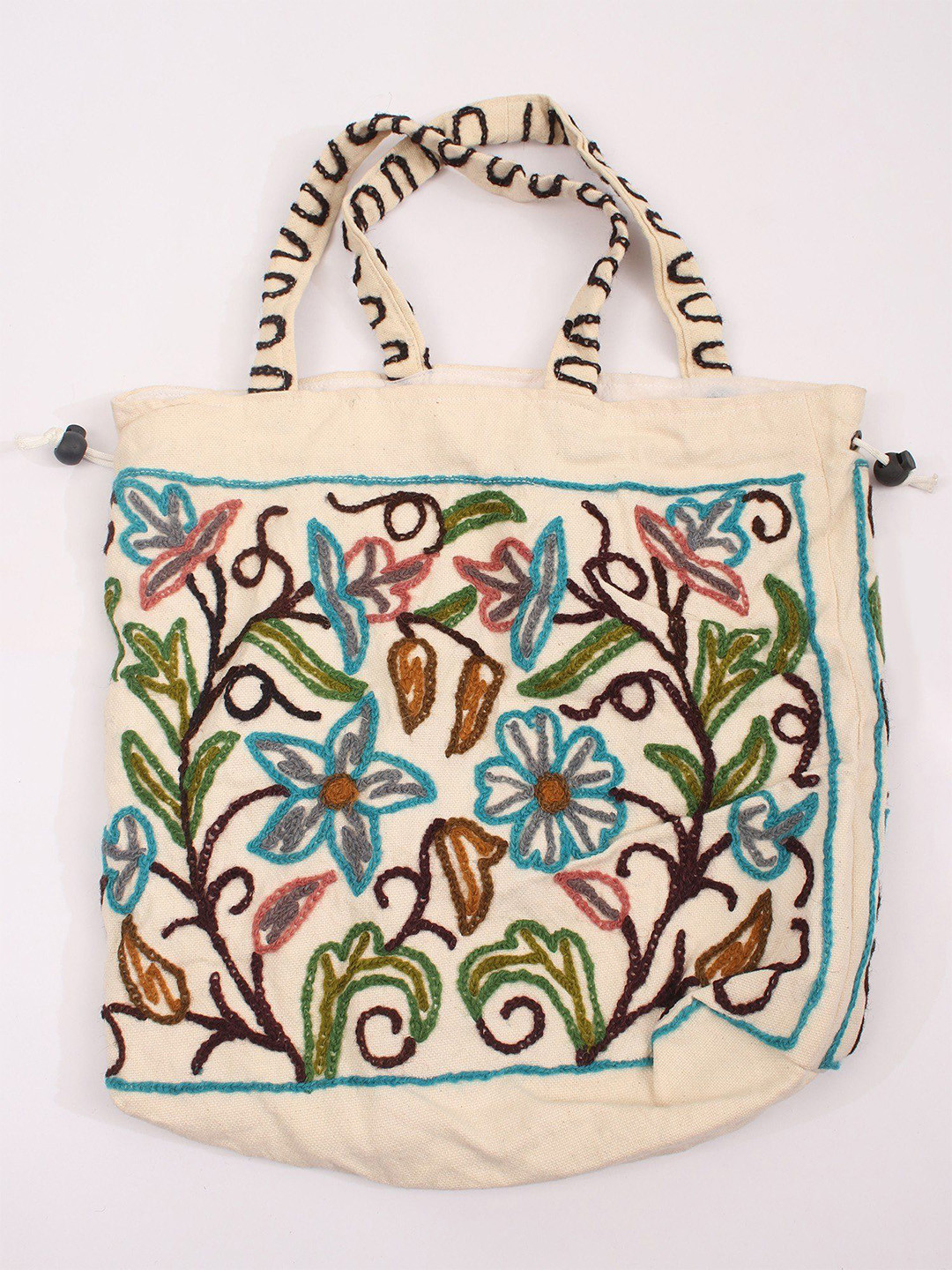 Exotic India Cotton Shoulder Bag with Crewel Embroidered Flowers