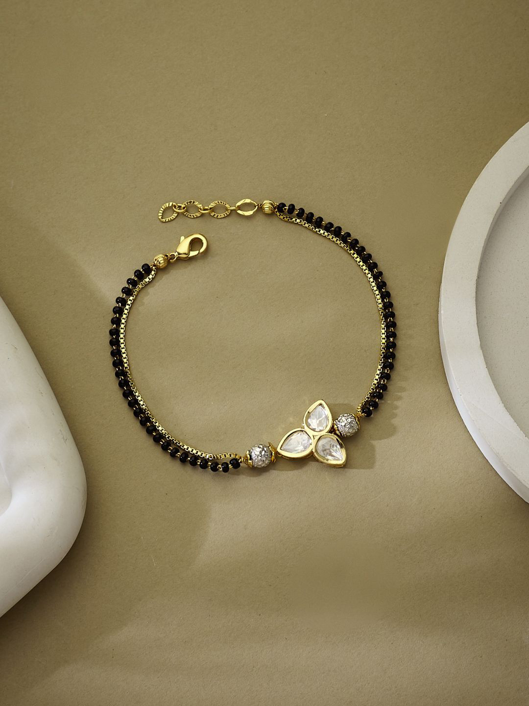 ATIBELLE Gold-Plated Kundan Stone Studded leaf shaped Hand Mangalsutra Bracelet