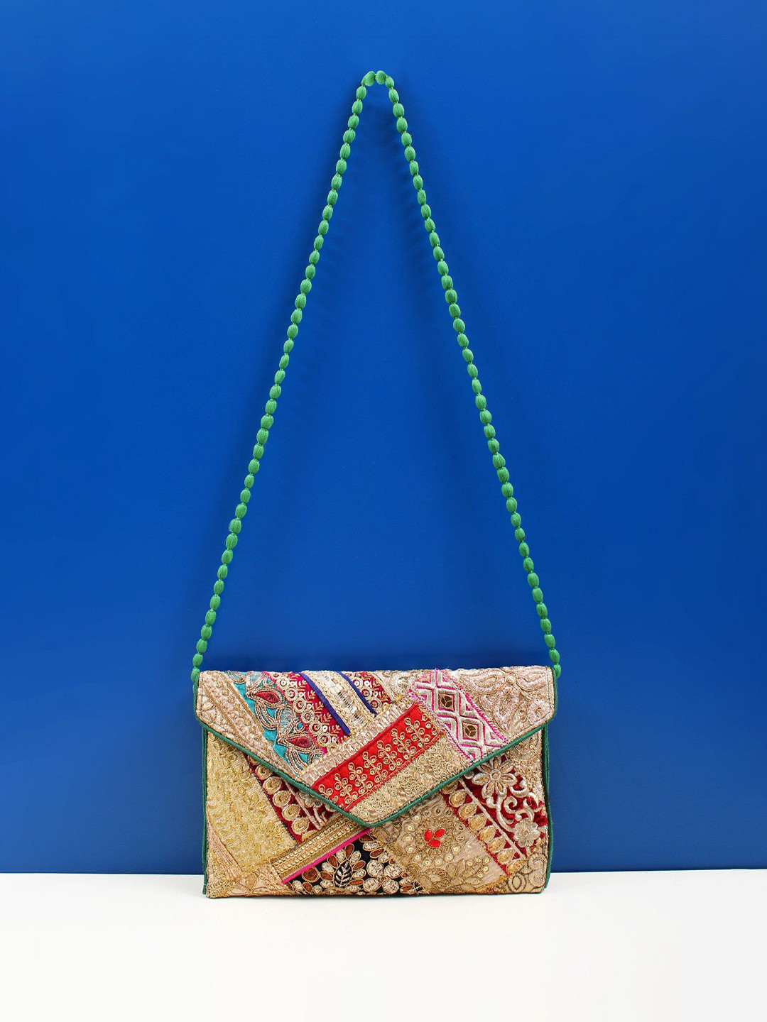 Exotic India Embroidered Zari & Sequinned Damru Dori Canvas Cotton Purse Clutch