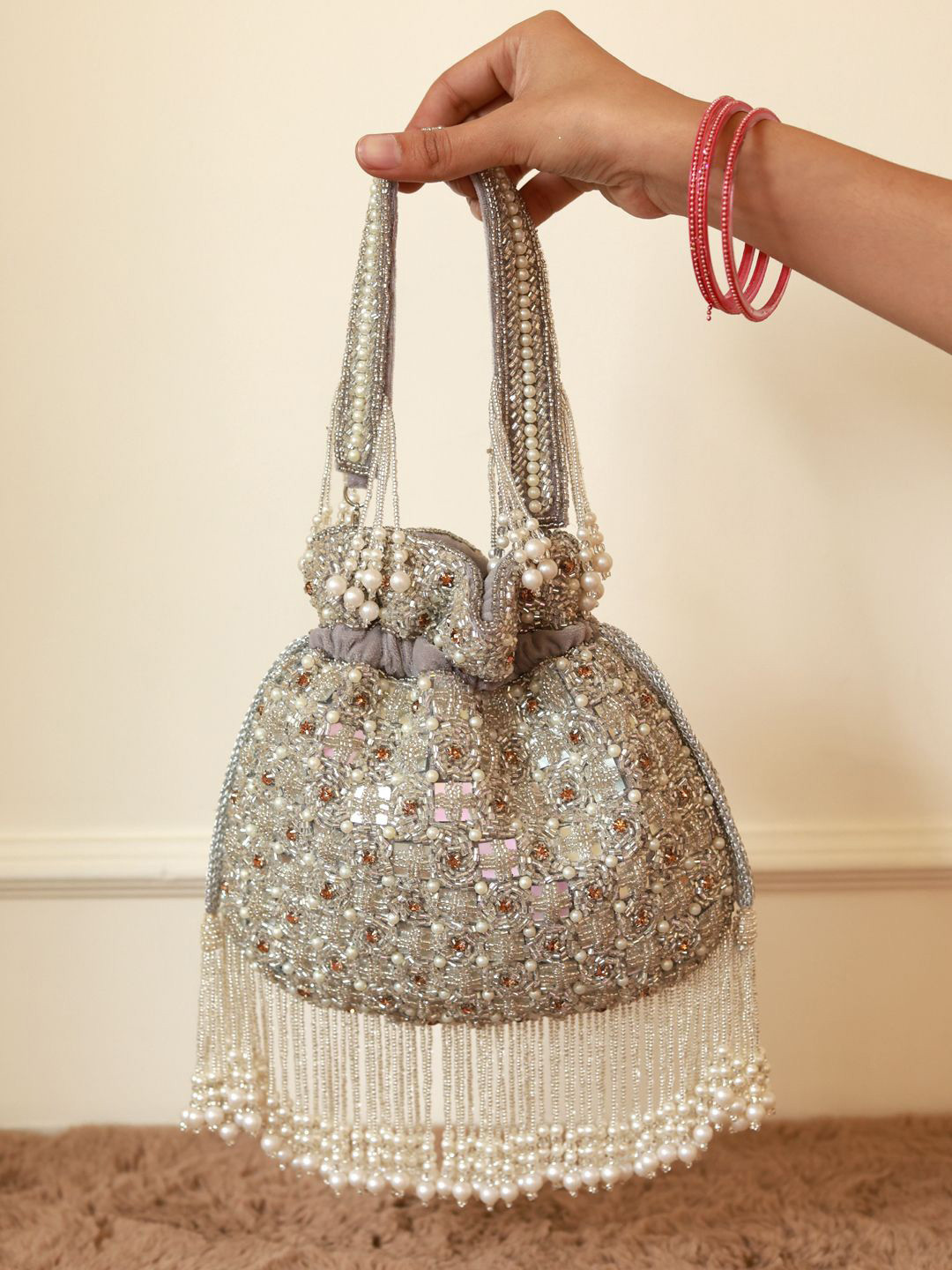 THE TAN CLAN Sehaj Embroidered Tasselled Suede Wrist Loop Potli Clutch