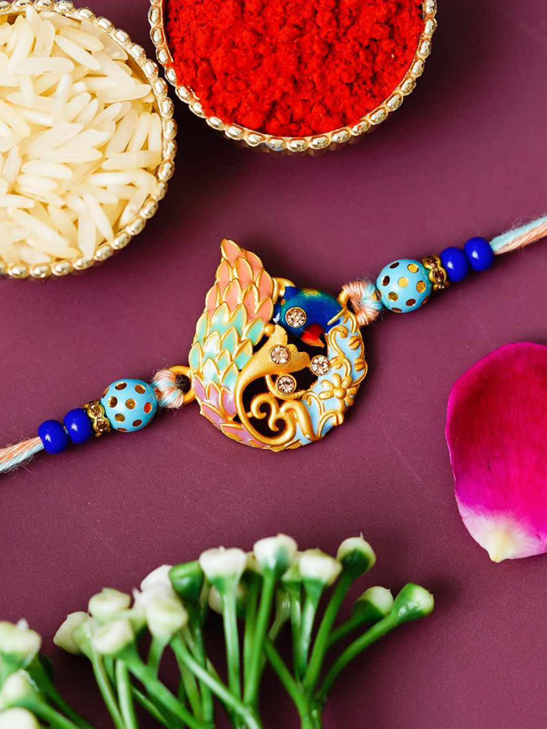 eCraftIndia Stones Studded Peacock Design Thread Rakhi