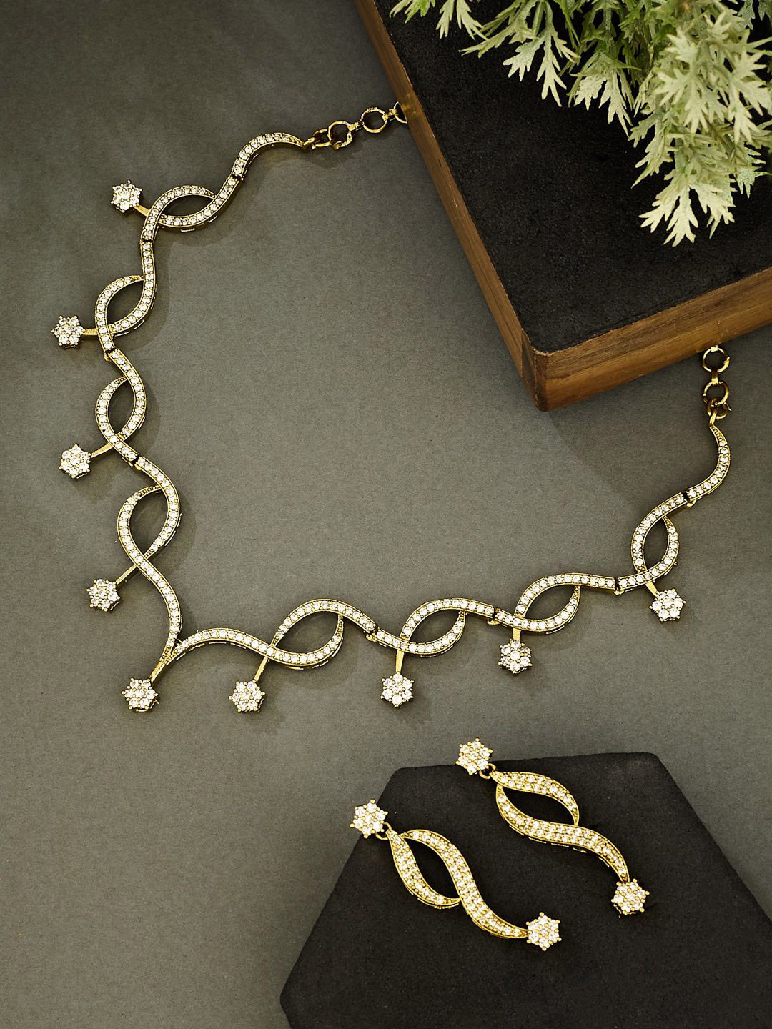 ATIBELLE Gold Plated CZ Stone Studded Floral Rope Shaped Jewellery Set