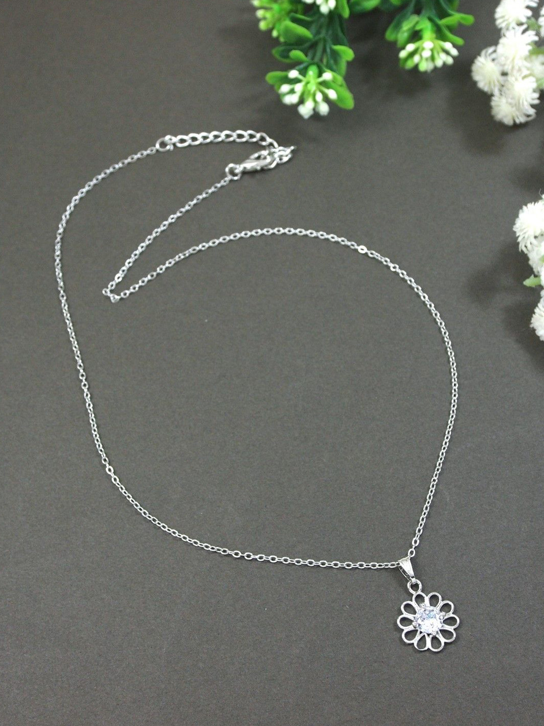 V FASHION JEWELLERY Silver-Plated Cubic Zerconia Studded Floral Shaped Pendant With Chain