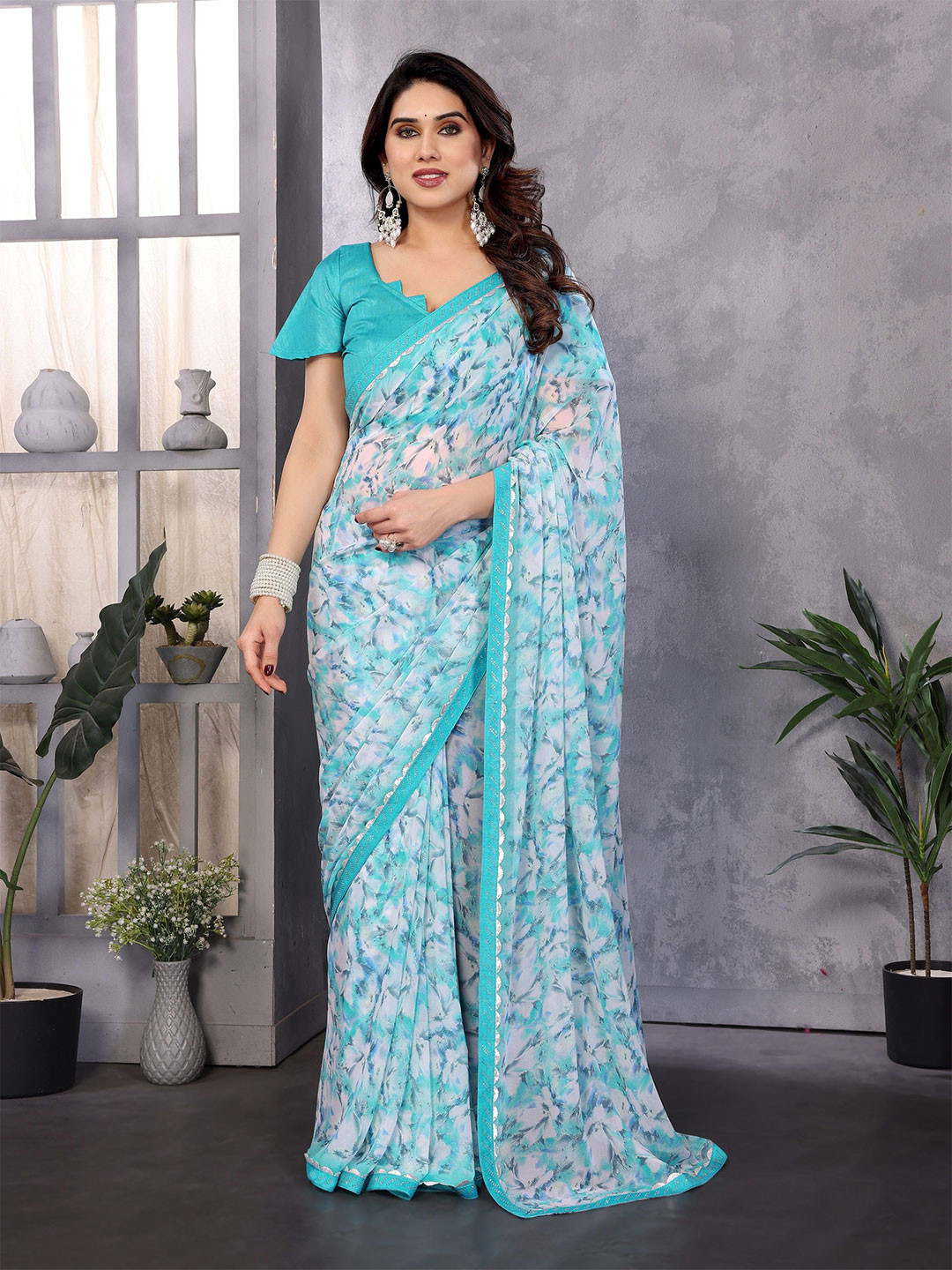 Ambuja International Floral Print Beads and Stones Pure Georgette Saree