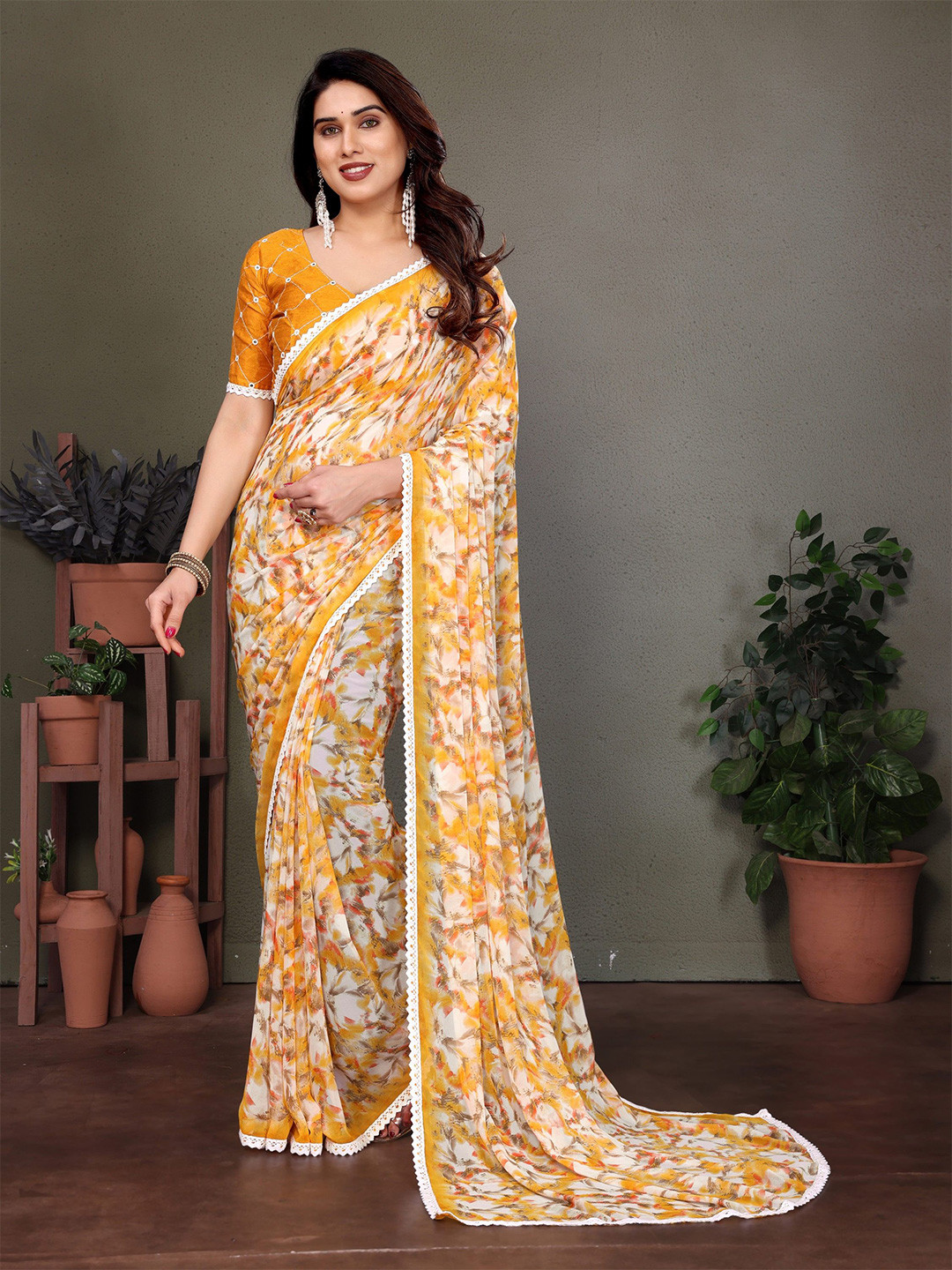Ambuja International Floral Print Embroidered Pure Georgette Saree