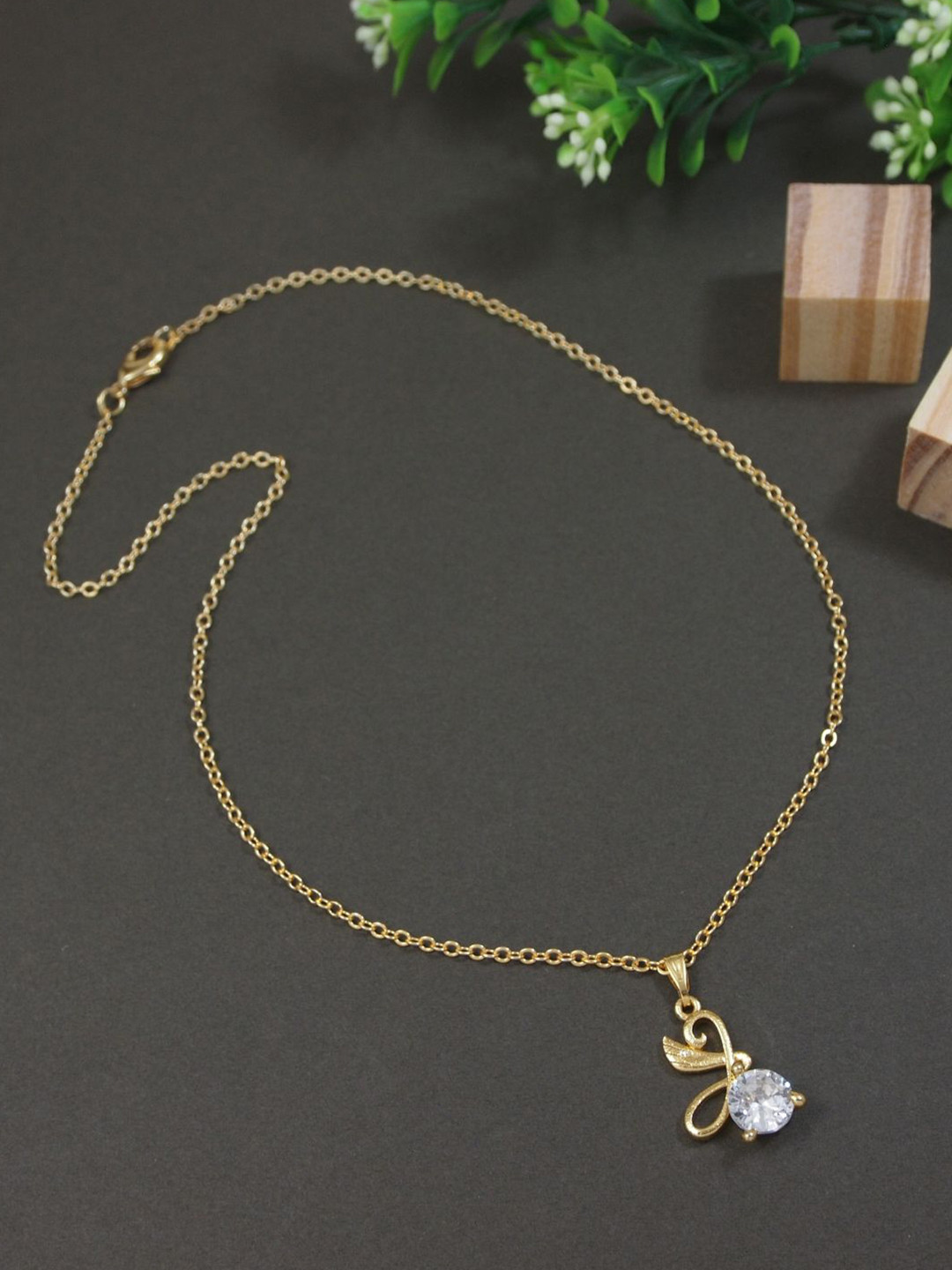 V FASHION JEWELLERY Gold-Plated American Diamond-Studded Pendant With Chain