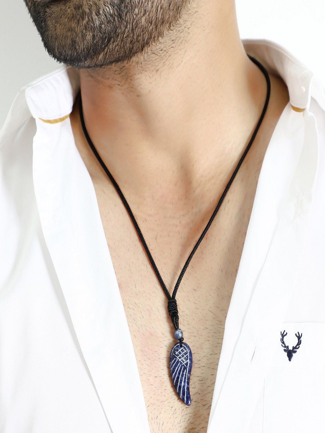 Nirvana Stainless Steel Lapis Lazuli Stones Studded Angel Wing Shaped Pendants