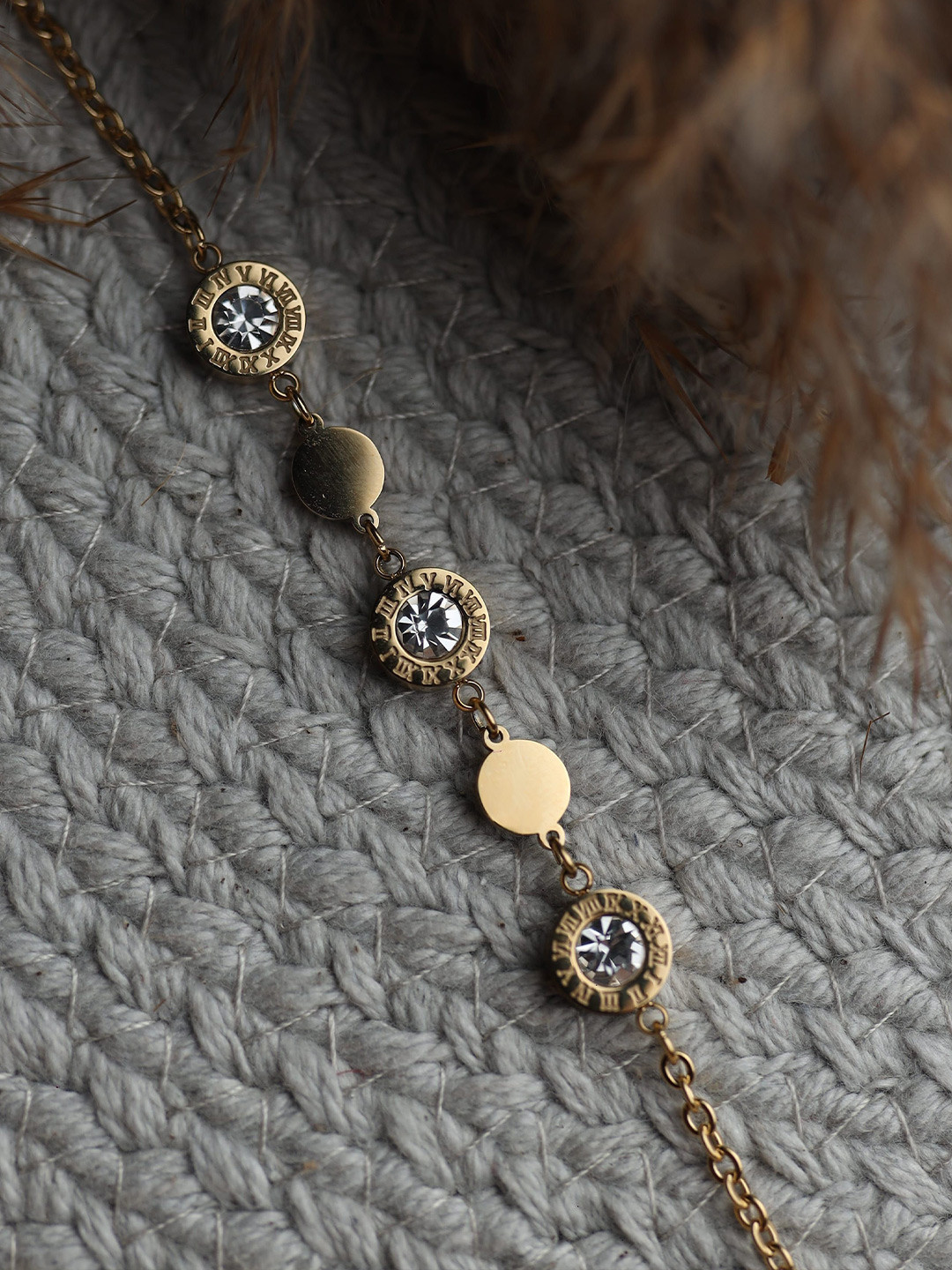 Ishil Gold-Plated Artificial Stones Studded Charm Bracelet