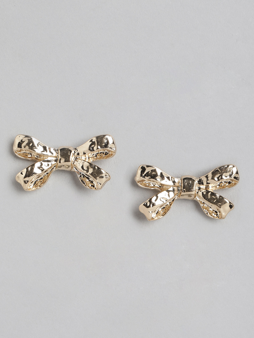 Forever New Gold Plated Textured Bow Shaped Contemporary Studs Earrings