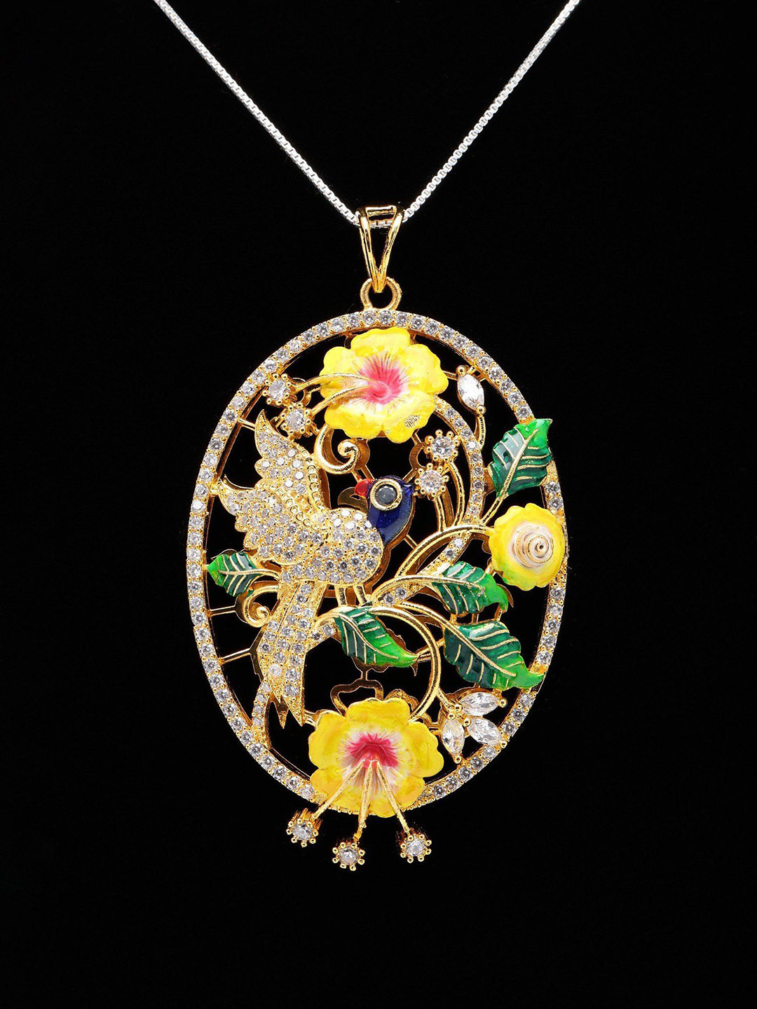 Exotic India Oval Shaped Floral Design Pendant And Earrings Set with Brass Material